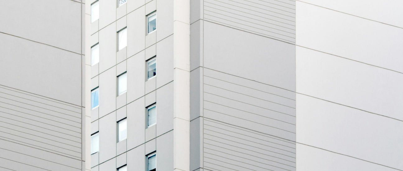 Outside a white building